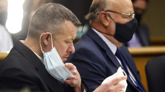 Paul Flores puts on a new N95 mask Aug. 3, 2021, at a preliminary hearing in San Luis Obispo, Calif., as he faces a murder charge in the disappearance of Kristin Smart. 